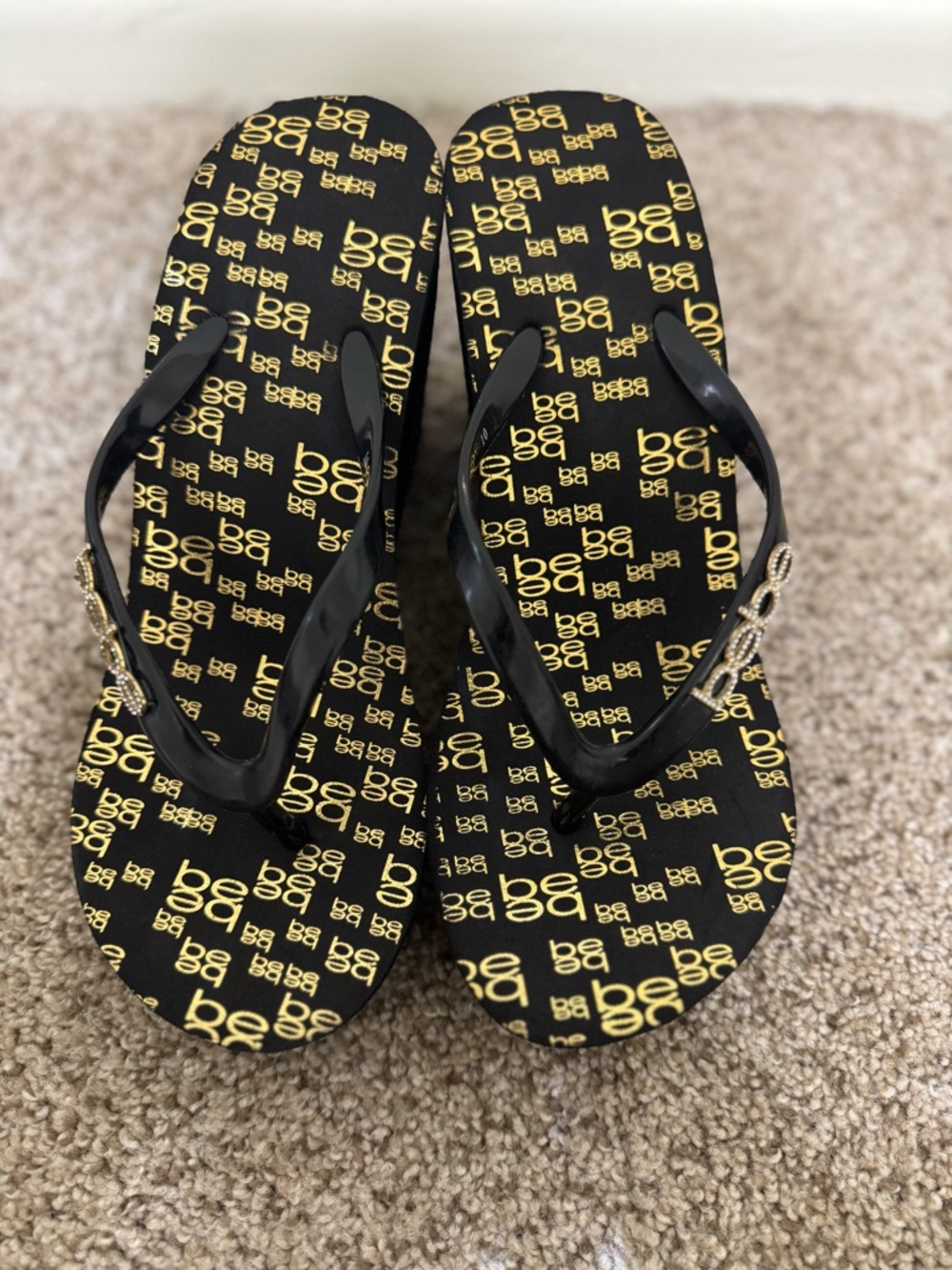 Bebe platform thong sandal Black and Gold Logo Flip Flops